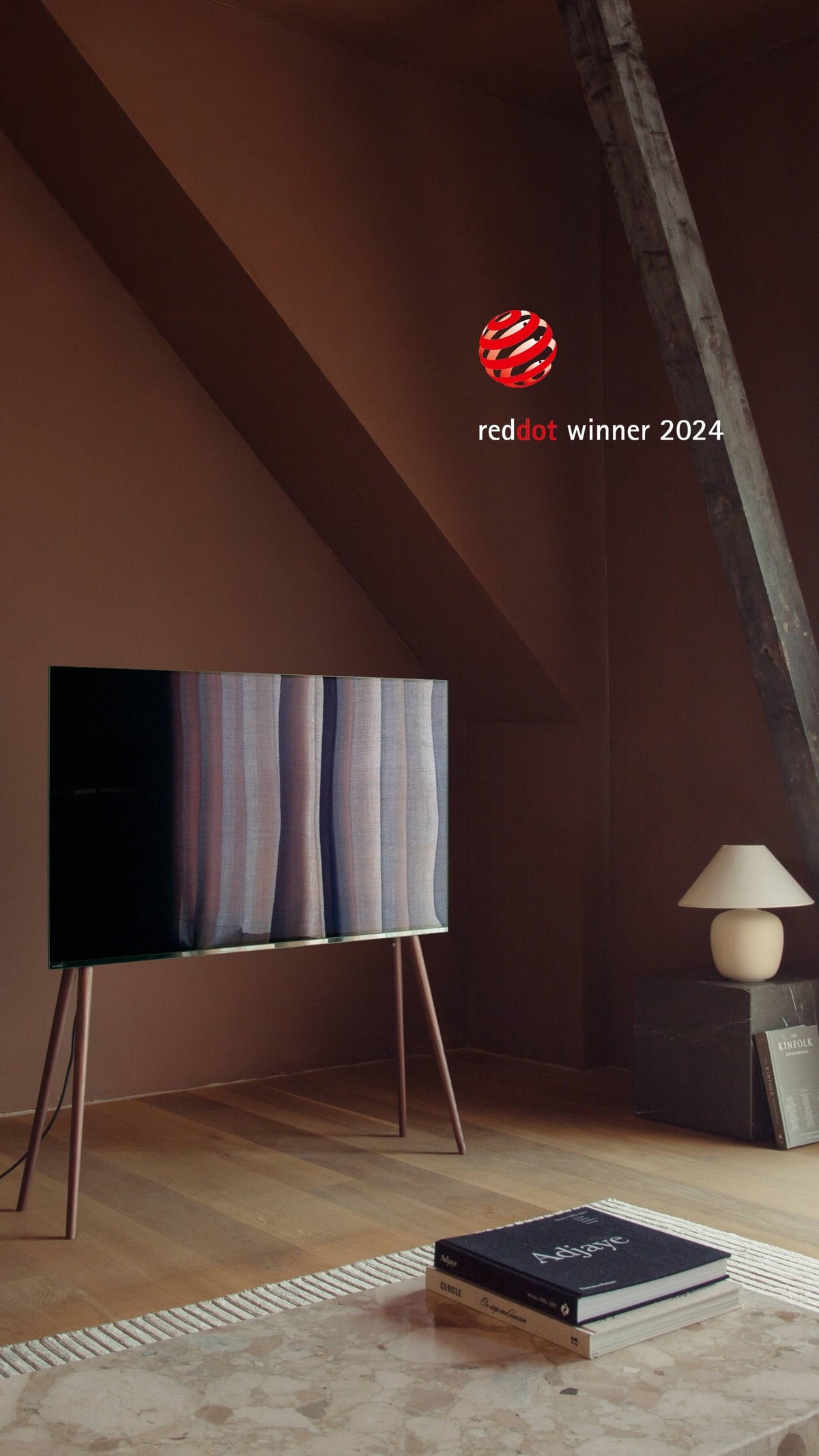 Freestanding JALG TV stand in a modern attic room, Red Dot Winner 2024, mobile layout