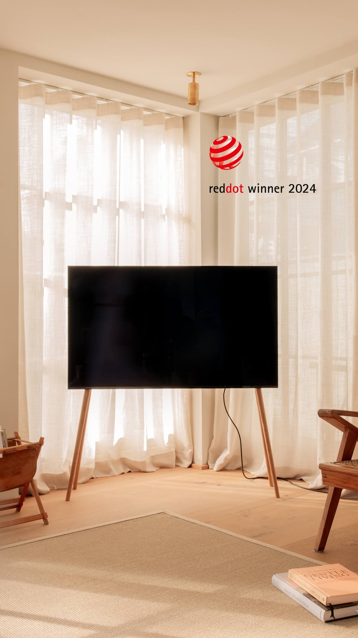 Freestanding JALG TV stand in a bright modern living room, Red Dot Winner 2024, mobile layout